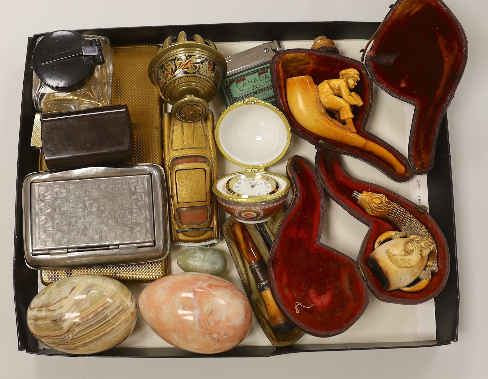 A group of mixed collectables including a Corgi James Bond Aston Martin DB, smoking pipes etc.
